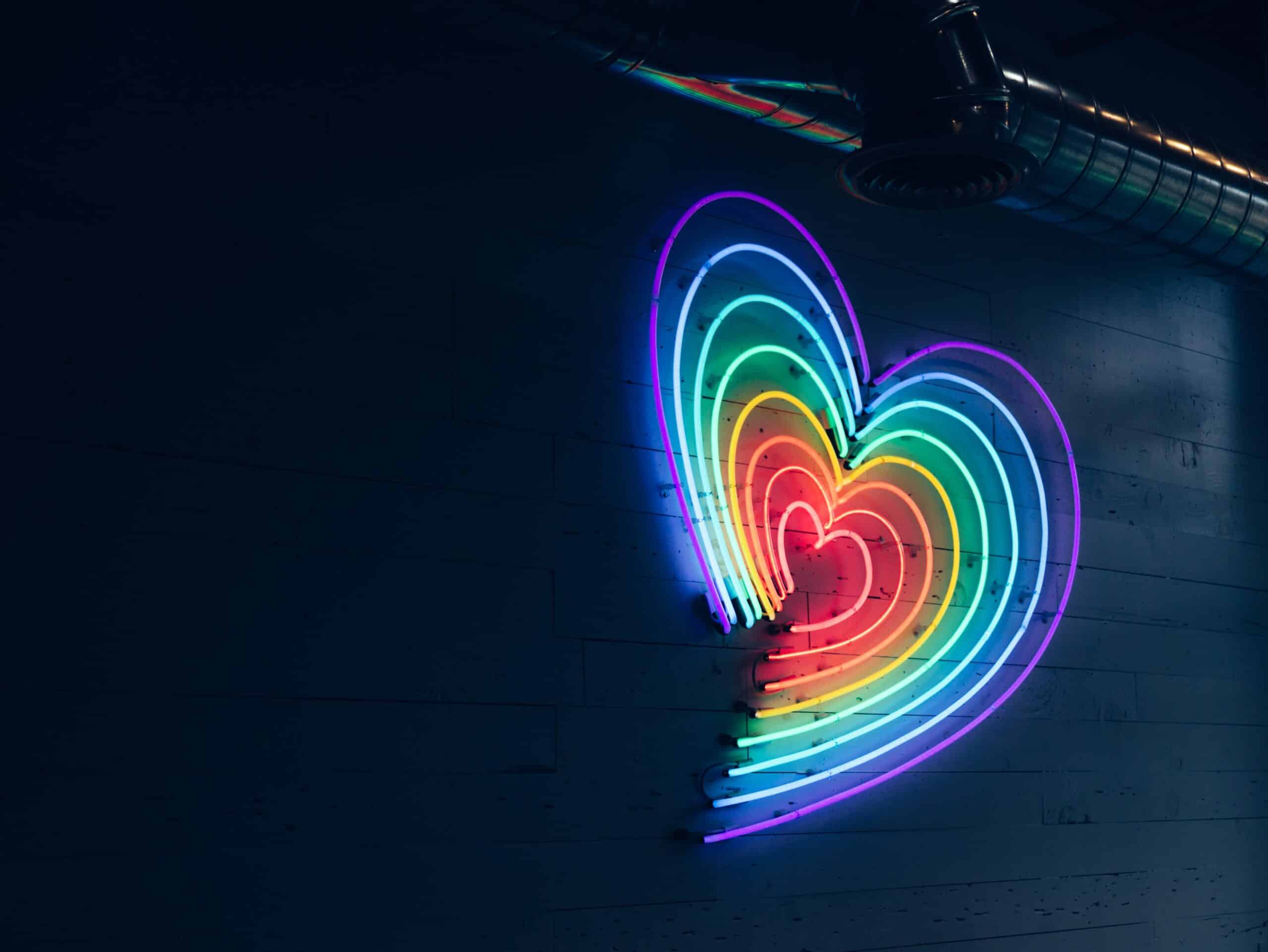 A neon rainbow symbolising a rainbow baby.