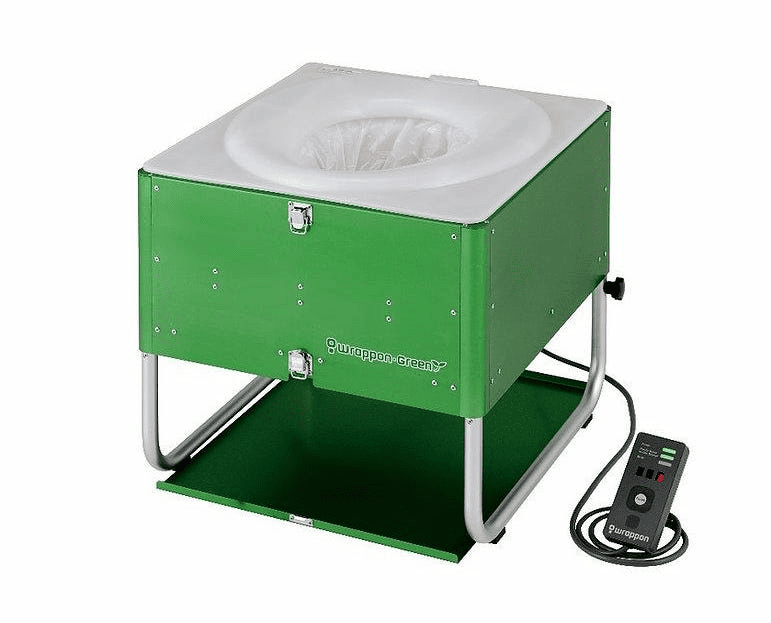 Wrappon Green Camping Toilet. A green base portable toilet with a toilet seat in the middle.
