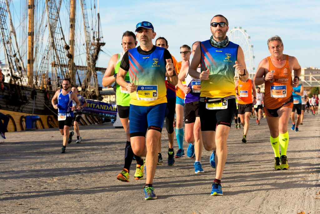 Runners in an event. Photo by Quino Al on Unsplash