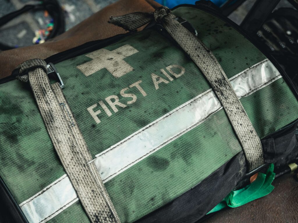 A green first aid kit. Photo by milan degraeve on Unsplash