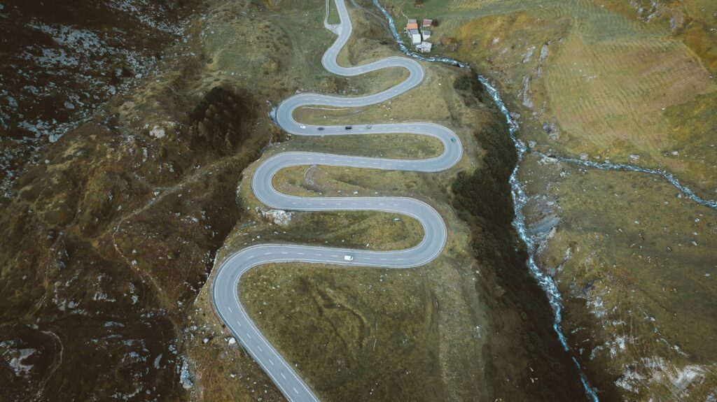 A twisty road. Photo by Chris Henry on Unsplash