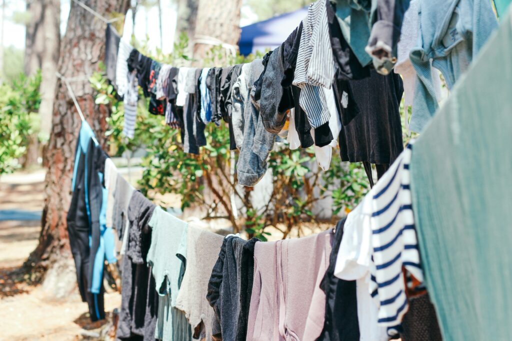Clothes hanging on a line. Photo by Brina Blum on Unsplash