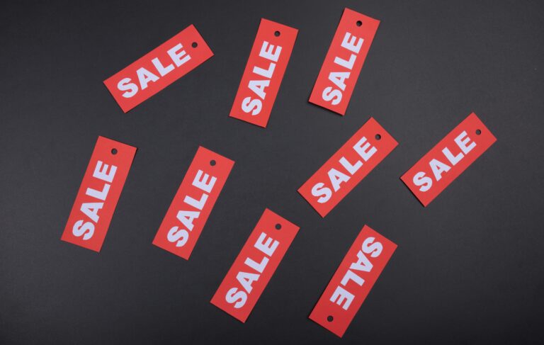 A sale sign. Photo by Tamanna Rumee on Unsplash