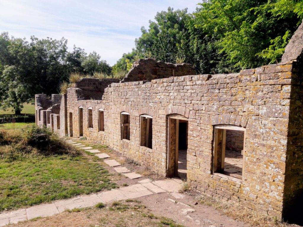 The four cottages along the Row in Tyneham Village. The remaining cottages show the shell of the previous residents' homes. Source: Rebecca Campbell Ltd