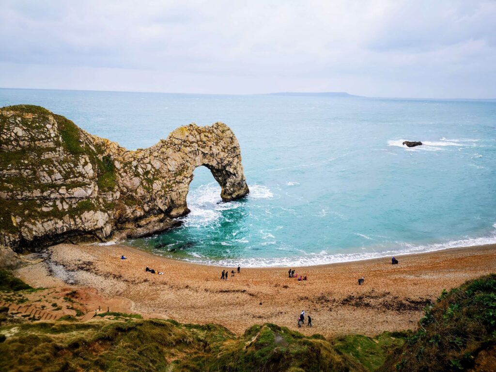 Overlooking Durdle Door in Dorset. The best family campsites in the UK. Photo: Rebecca Campbell Ltd