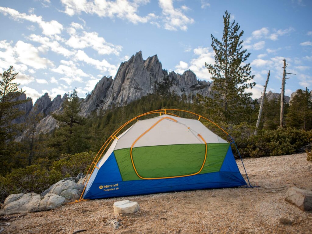 A pitched inner tent outside. Photo by Mazin Omron on Unsplash